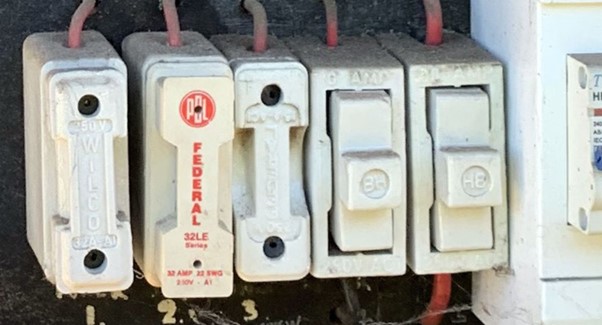 Ceramic Fuses inside old electrical switchboard