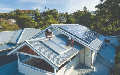 solahart installers on roof of home installing new solahart solar panels