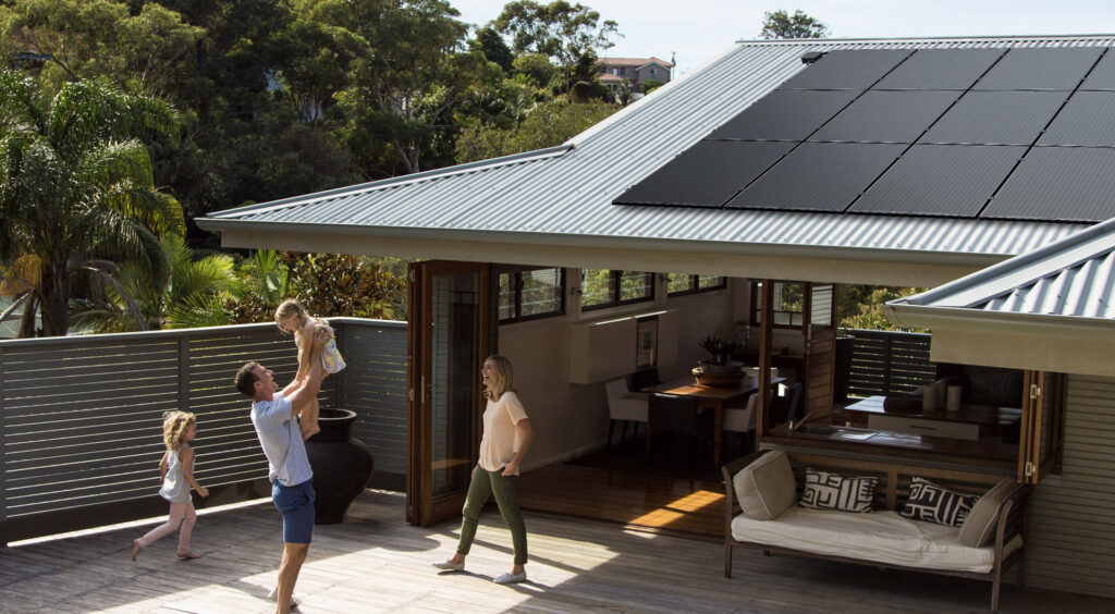 Silhouetter solar panels on house